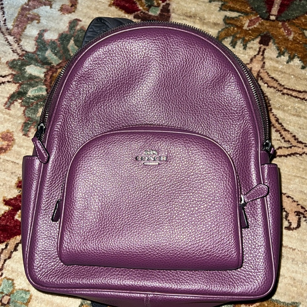 Coach backpack in purple.